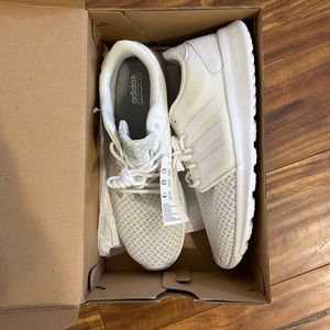 Brand new all white women’s adidas athletic shoes